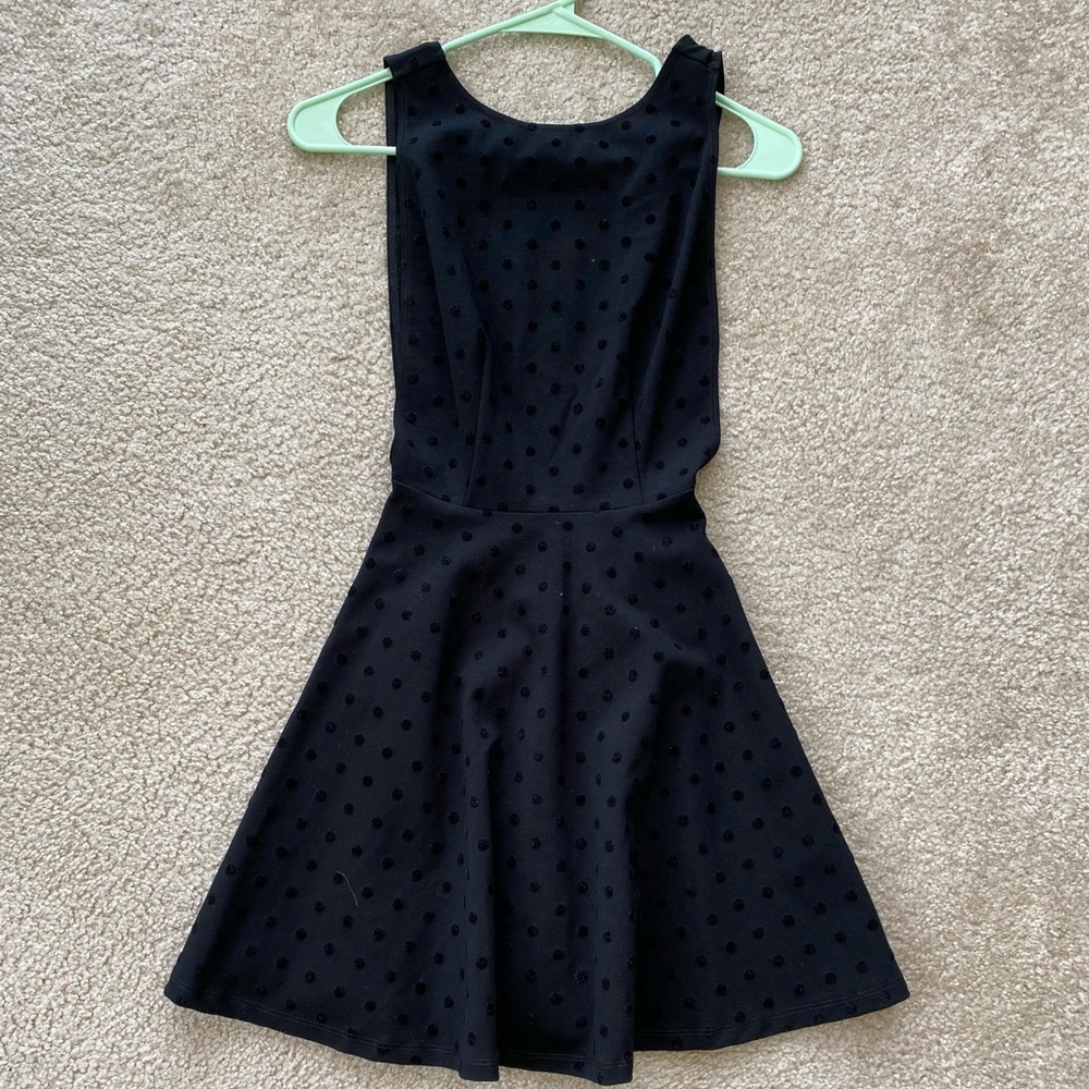 Low back little black dress.